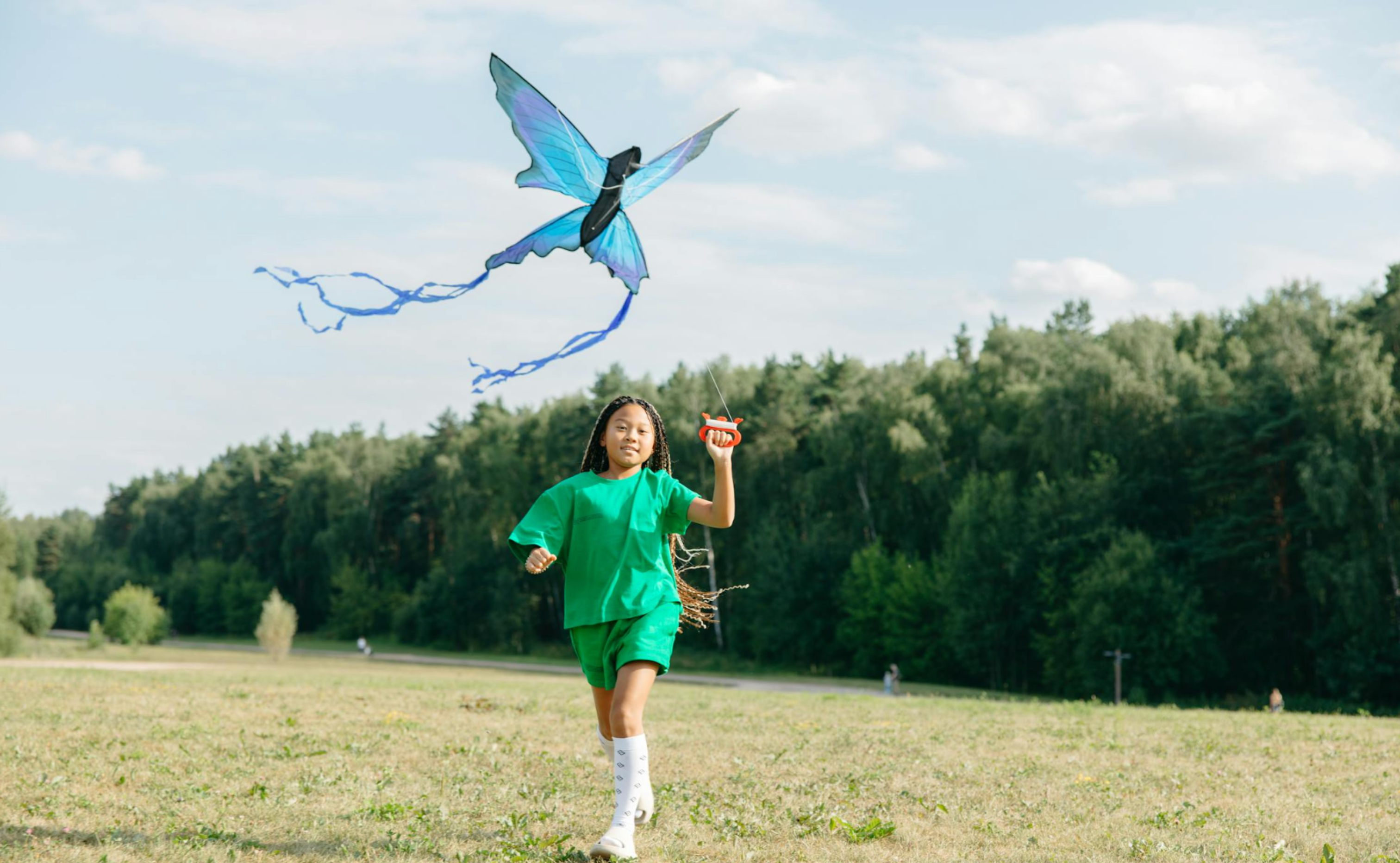 girl flying a kite
